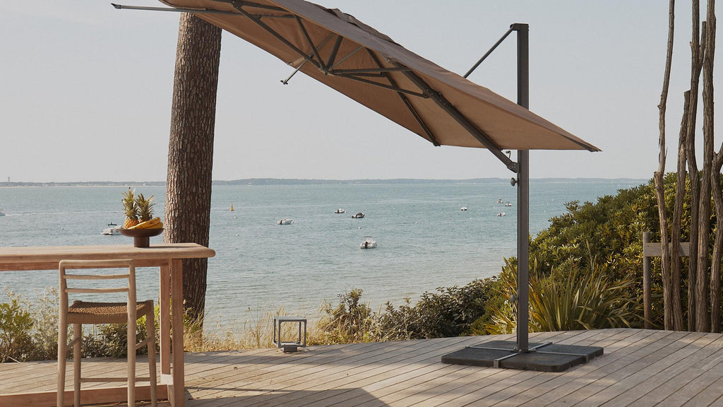 Cantilever parasol with sea in background