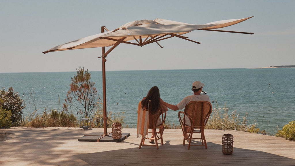 A couple under a cantilever parasol 