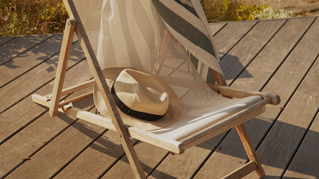 A hat on a garden chair